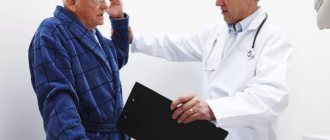 doctor examines a patient with spots in front of his eyes