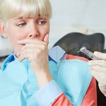 Женщина с дентофобией